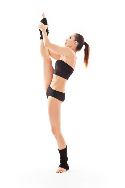 Young beautiful baliet dancer posing on a studio — Stock Photo, Image