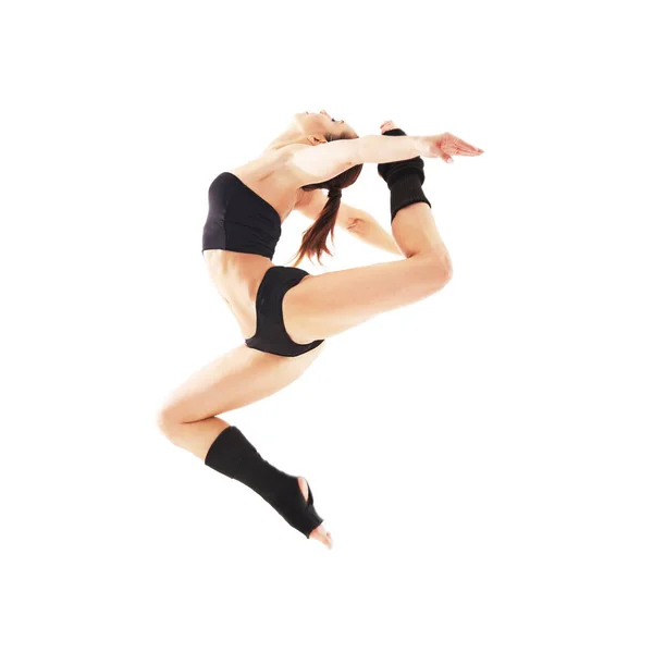 Young beautiful baliet dancer posing on a studio — Stock Photo, Image