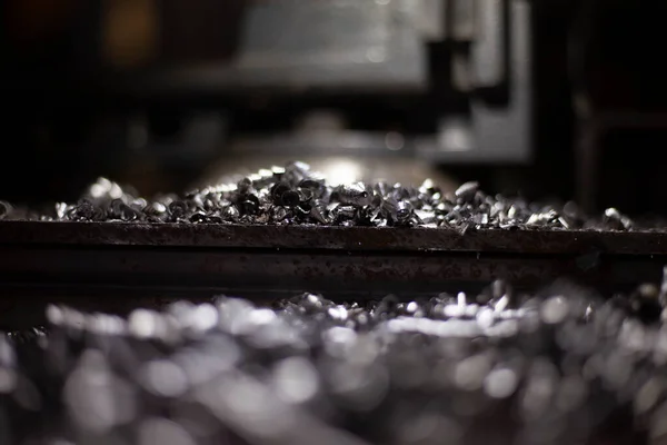 Metal shavings on the table. — Stock Photo, Image