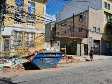 RIO DE JANEIRO (RJ) Brazil 02/03/2024. Woman dies and man is injured after house collapses on top of car, in the city of Rio de Janeiro clipart