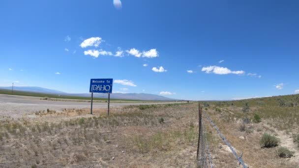 Tid Förflutit Footage Idaho Välkommen Logga Interstate Lämnar Utah — Stockvideo