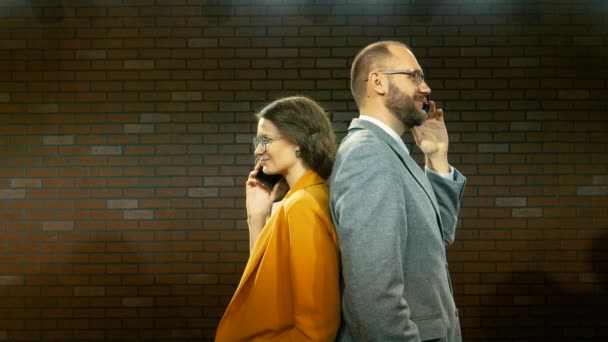 Man and woman are talking on the phone 01 — Stock Video