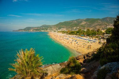 Güzel bir plaj Kleopatra Plajı, eğlence için turistler arasında popüler. Alanya, Antalya bölgesinde, Türkiye, Asya