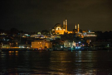 Istanbul, Türkiye: Gece görünümü içinde belgili tanımlık geçmiş ünlü Süleymaniye Camii ile gün batımında Galata Köprüsü, Sultanahmet, sonunda Restoranlar '.