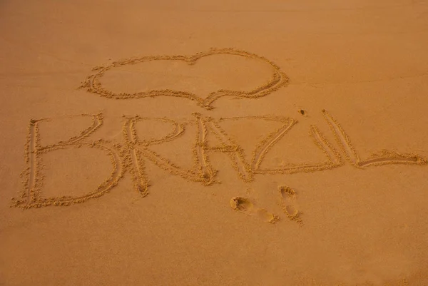 BRAZIL: Inscription on the sand, drawing with the name of the country Brazil. — Stock Photo, Image