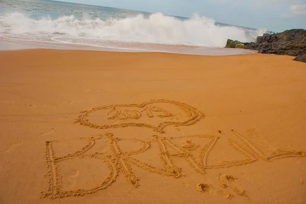 BRAZIL: Inscription on the sand, drawing with the name of the country Brazil. — Stock Photo, Image