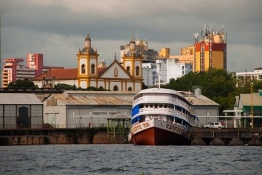 Manaus, Amazonas, Brazil: Matriz Church. Popular tourist trip on the ship. View from the boat to the port city of Manaus. clipart