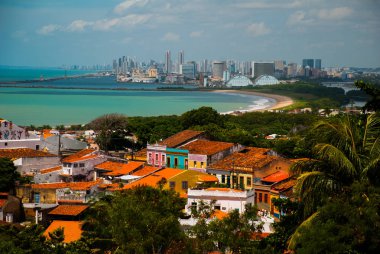 Olinda, Brazil: A view of Olinda's historic center from the top of Alto da Se hill, Recife in the background clipart