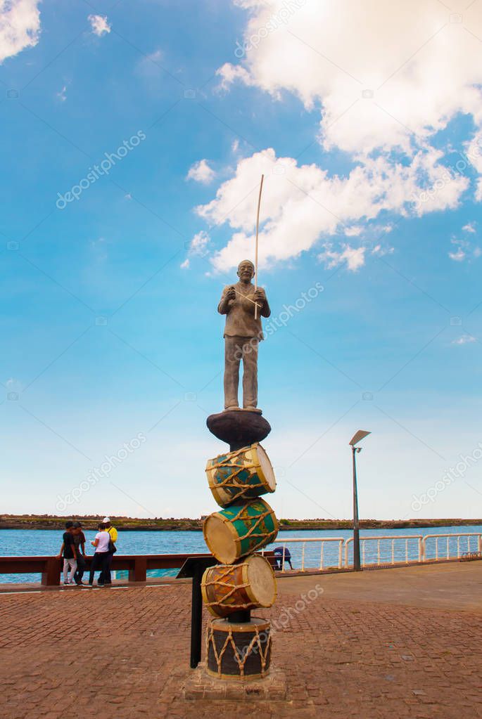 Recife, Pernambuco, Brazil: Sculpture of a man on drums in the city center.
