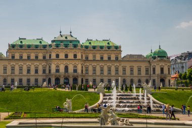 Vienna, Austria. Upper Belvedere Palace with reflection in the water fountain. clipart