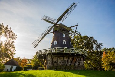 MALMO, SWEDEN: Traditional old wind mill in the park of Malmo town clipart