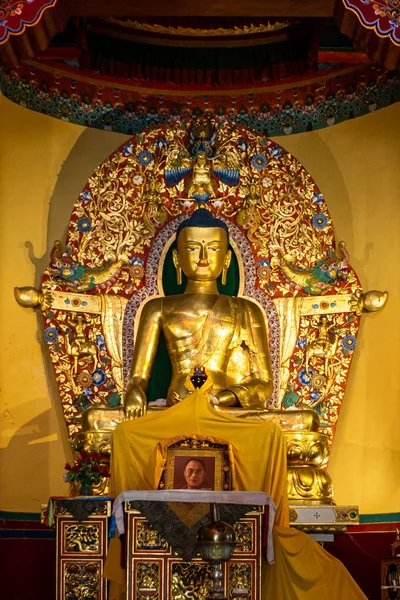 Buddha statue in temple in Tibetan art center in Norbulinka Institute Dharamsala.