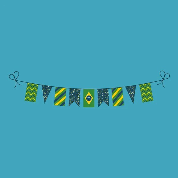 フラットデザインでブラジルの国民の日の休日のためのフラグをバンティング装飾 独立記念日又は国民の日の休日の概念 — ストックベクタ
