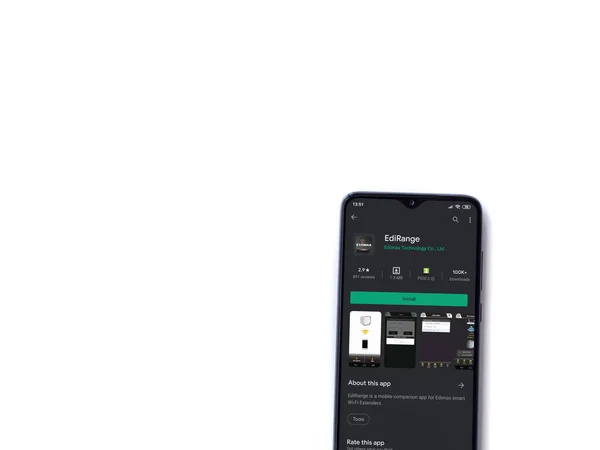 Lod Israel 2020年7月8日 Edirangeアプリストアページが白い背景に隔離された黒い携帯電話の表示に表示されます コピースペース付きのトップビューフラットレイ — ストック写真