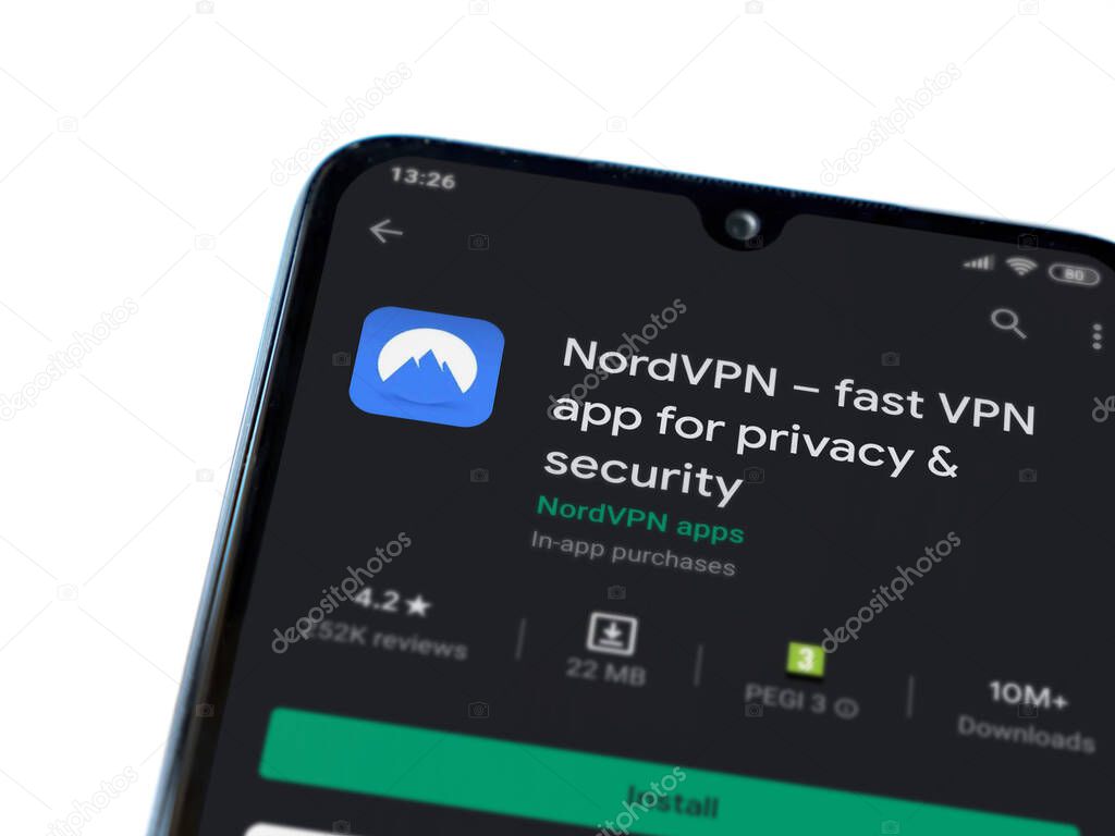 Lod, Israel - July 8, 2020: NordVPN app play store page on the display of a black mobile smartphone isolated on white background. Top view flat lay with copy space.