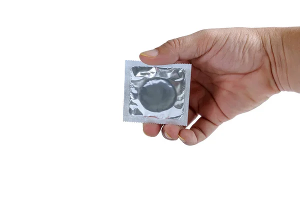 手里拿着一个新的避孕套 发现了避孕套的喜悦和期待的快感 — 图库照片