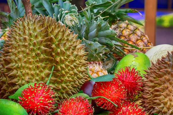 Many fruits stacks wait for a sale.