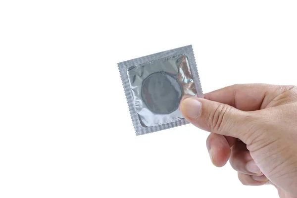 手里拿着一个新的避孕套 发现了避孕套的喜悦和期待的快感 — 图库照片