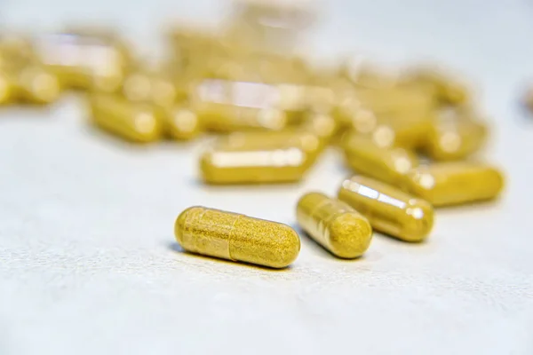 Pharmacy theme, Heap of brown round capsule pills