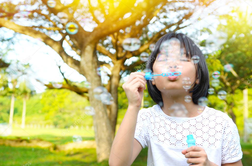 Outdoor bubble asian young