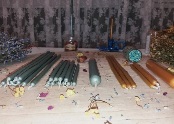 Gold and silver candles, minerals and dried herbs and ritual salt for witchcraft