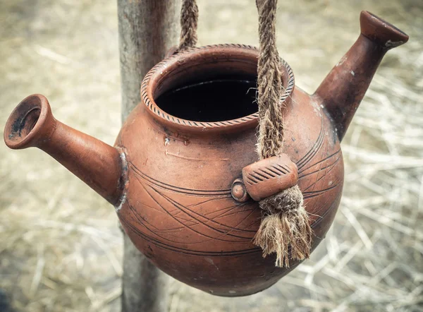 Ancient washing pot. Clay pot with two spouts for washing Ancient Russia slavonic untencil