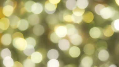 Bulanık Bokeh Noel Parlayan Altın Arka Plan. Noel ışıkları. Altın Tatil Yeni Yıl Soyut Glitter Defocused Arka Plan Yanıp Sönen Spot ve Kıvılcımlar ile.