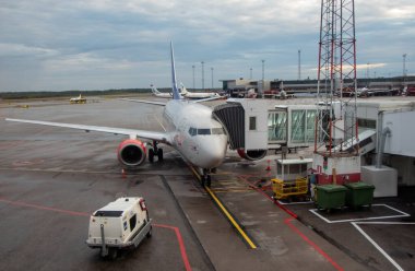 İsveç, Stockholm, Arlanda havaalanı terminalindeki SAS uçakları..