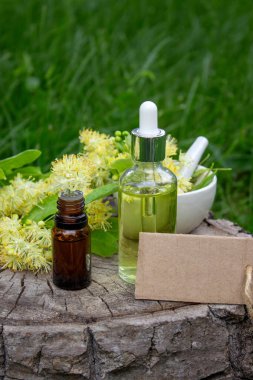 Linden çiçekleri ve gerekli yağ, bitkisel ilaçlar.