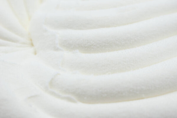 White ice cream background, close-up. 