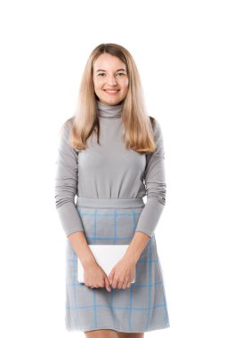 Tema iş kadın teknoloji. Güzel genç eller gri elbiseli tablet ile ayakta poz beyaz sarışın kadın beyaz arka plan yalıtmak. Meslek pazarlamacı satış sosyal medya reklam.