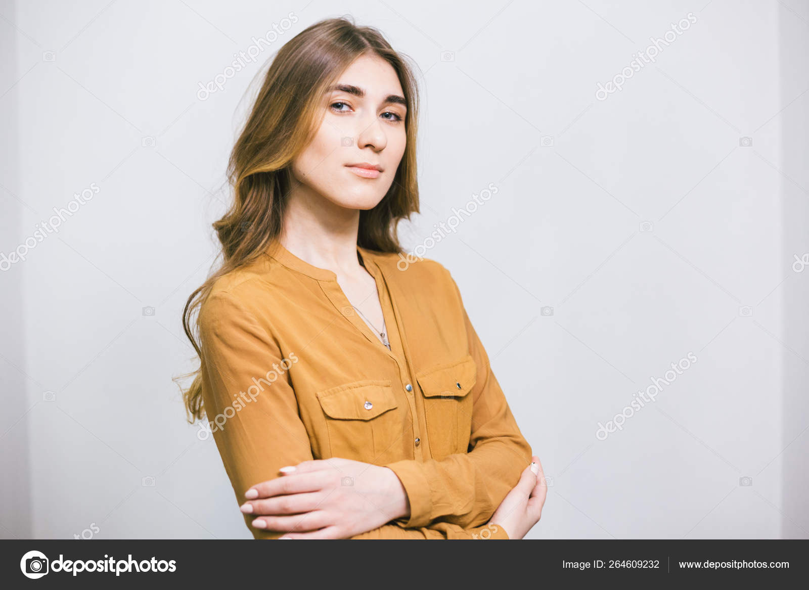 Portrait Of Beautiful Woman With Curly Long Hair On White