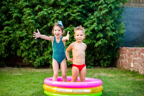 Two Children Beach Ball Swimming Pool Joyful Kid Playing Inflatable — Stock Photo, Image