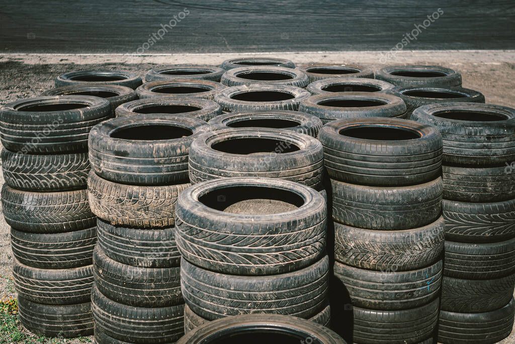 https://st4.depositphotos.com/4676639/39386/i/950/depositphotos_393863790-stock-photo-many-old-used-car-tires.jpg?utm_source=chatgpt.com