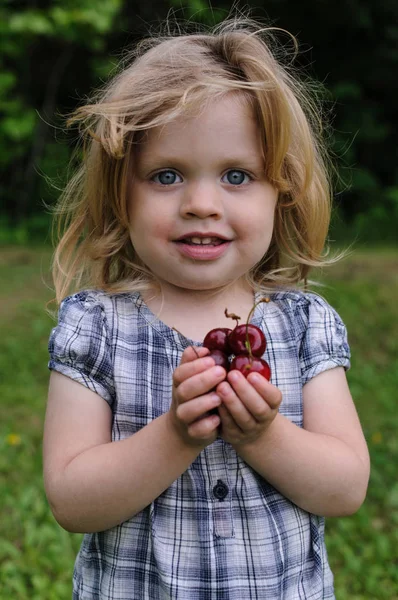 Little Girl Cherry Her Hands Forest — Stock Photo, Image