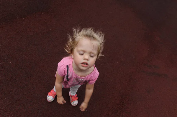 Capricious Little Girl Dark Red Background — Stock Photo, Image