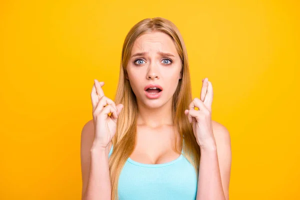 Portrait Young Concentrated Woman Praying Crossed Fingers Isolated Yellow Background — Stock Photo, Image