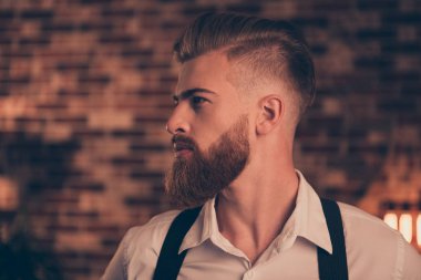 White shirt swag style mature vintage concept. Side half-faced profile view close up portrait of stunning virile masculine serious concentrated cool experienced expert hairdresser looking aside clipart