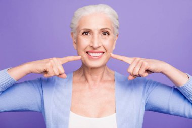 Concept of having strong healthy white perfect teeth at old age. clipart