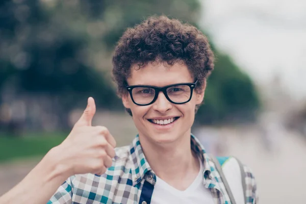 Portrait of curly haired cute attractive handsome smiling guy we — Stock Photo, Image