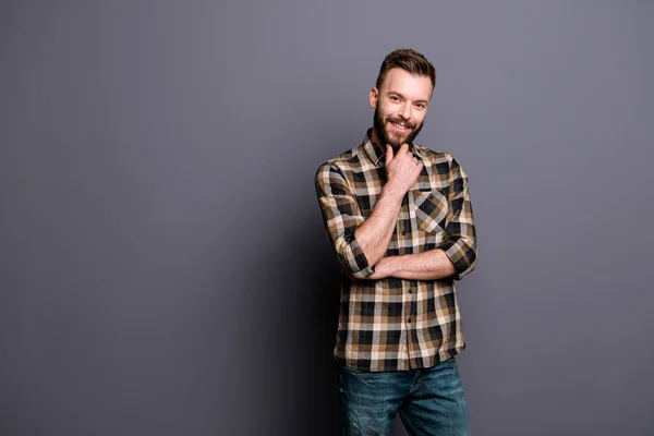 Portrait of young happy brunet man in brown checkered shirt and — Stock Photo, Image