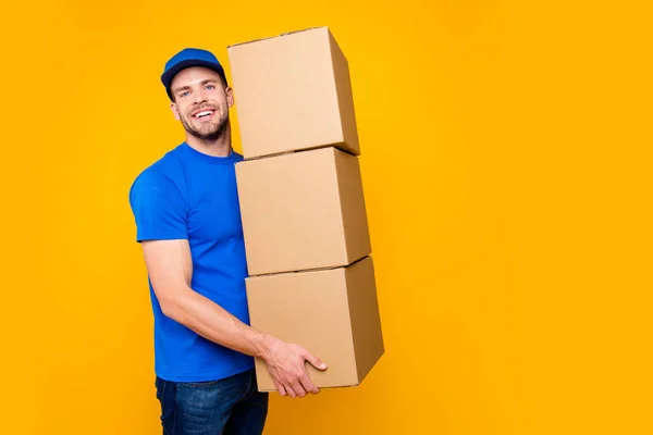 Portrait of handsome attractive funny bearded deliver in blue un — Stock Photo, Image