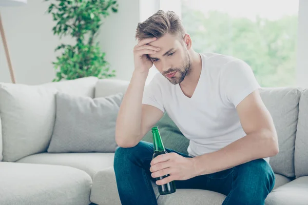 Ponder, pensive concept. Portrait of upset alcoholic man with he — Stock Photo, Image