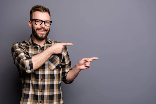 Cute attractive man in spectacles isolated on gray background sh — Stock Photo, Image