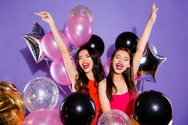 Two young woman in casual outfit close eyes raised hands up loud — Stock Photo, Image