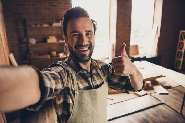 Good day mood build builder construction constructor engineer workman repairman concept. Close up photo portrait of cheerful glad handsome beaming toothy bearded guy make take selfie on smart phone