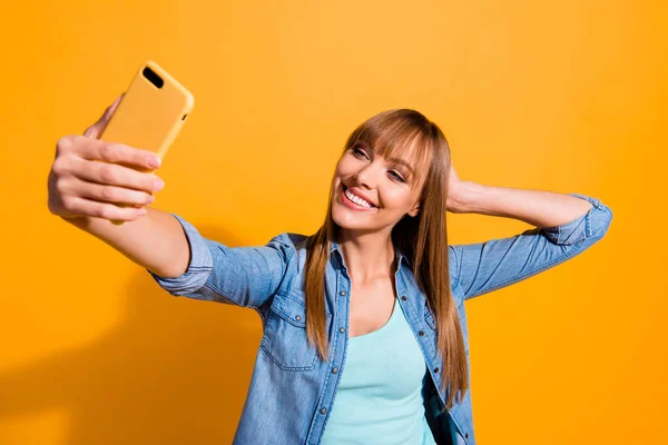 stock image Portrait of her she nice adorable sweet lovely attractive cheerful cheery straight-haired lady making taking selfie day isolated over bright vivid shine yellow background