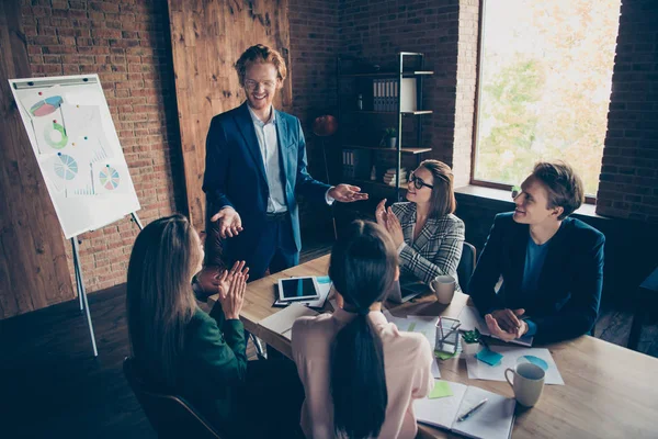 Close up photo business people he he he his her her partners marketing charts table office together income earnings money clapping boss chief great training course coacher dressed suits formalwear — Foto de Stock