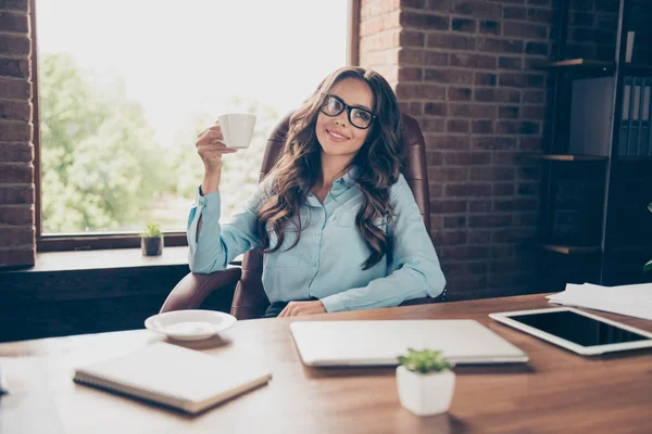 Close up photo beautiful she her business lady hands hold white coffee cup look up imagination flight everybody need little break sit comfortable big office chair wearing formal wear suit shirt — стоковое фото