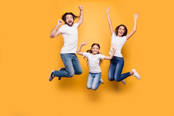 Full length body size portrait of nice lovely adorable attractive positive cheerful people dad daddy mom mommy spending spare free time isolated over shine vivid pastel yellow background — Stock Photo, Image